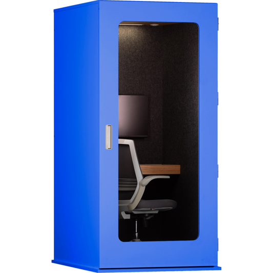 A bright blue enclosed office cubicle with a glass front panel, showing a black office chair, desk, and computer monitor inside against a white background.