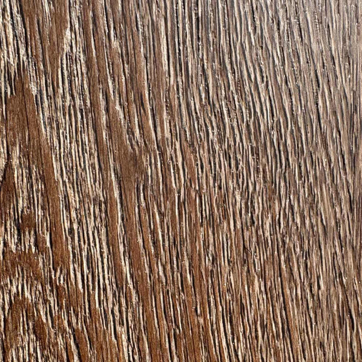 Close-up of a wooden surface with a brown and beige color pattern