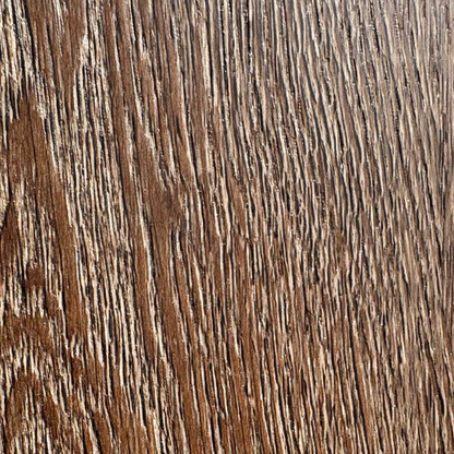 Close-up of a wooden surface with a brown and beige color pattern